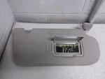 2023 Nissan Pathfindr Passenger Right Side Gray Cloth Sun Visor W/lighted Mirror. Fixed Price $56.95.