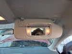 2014 Ford Fusion Passenger Sun Visor Illuminated Black Used 268-01234R. Fixed Price $80.70.
